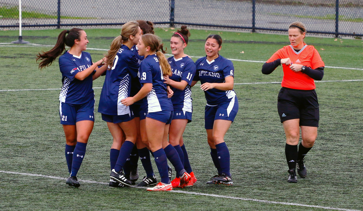 Blues players (left to right) Aynsley Hurtado, Mya Fraser, Alanah Dulong, Caitlyn Chiu, Maya Smith and Alexis King celebrate after a penalty kick goal by Dulong as part of a 2-0 win Oct. 14 at VIU (photo courtesy of Matt Carter/VIU Athletics)